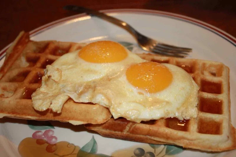 Golden waffles with eggs