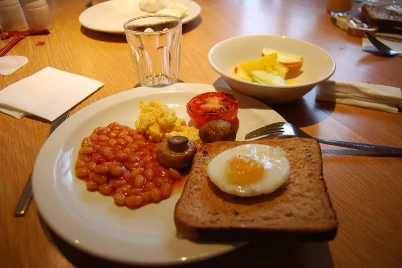 Full breakfast plate with eggs and toast
